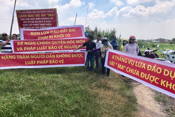 Kẻ lừa đảo sẽ yêu cầu khách hàng đặt cọc số tiền lớn cho đất nền dự án ma